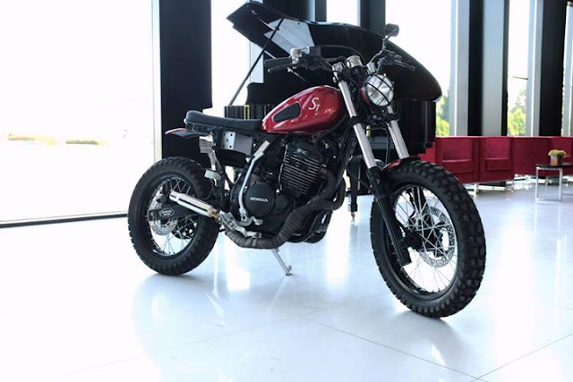 1988 Honda NX Dominator S1 by Sameiros Motors Sameiros Motors was born on January 1, 2013 in Portugal, two brothers who love bikes, first project, is this 1988 Honda NX Dominator S1, with the nickname “Lose the Wheels”,