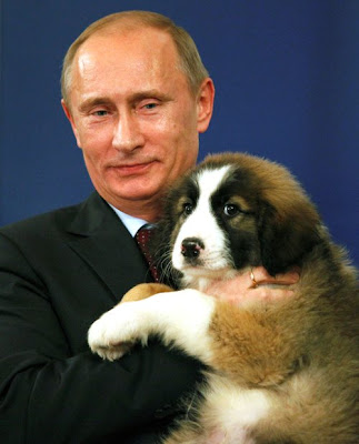 Vladimir Putin Cuddles With A Puppy Seen On  www.coolpicturegallery.us