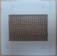 Rejilla de Ronchi hecha con marco de una diapositiva y mosquitera