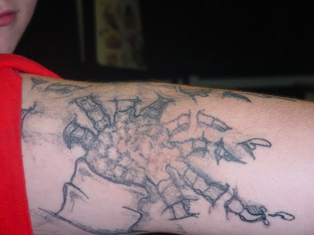 "Bad (Not Bad Ass) Tattoo" : Reptile Fingers? http://gradeatattoos.com/