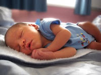 Baby boy sleeping. Stock Photo credit: bonesdog