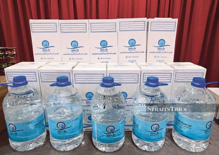 An authorized 5-liter package of bottled Zamzam water.