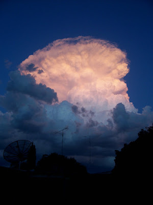 cumulonimbus thunder storm clouds at sunset