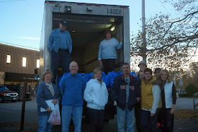 volunteers happy and ready to distribute the meal kits