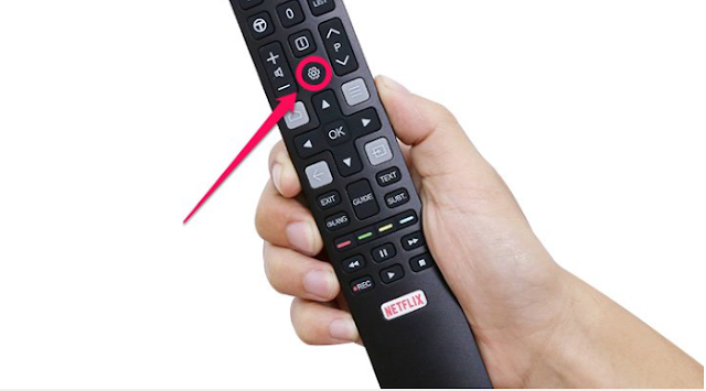 Nhấn nút Cài đặt “Hình răng cưa” trên remote tivi.
