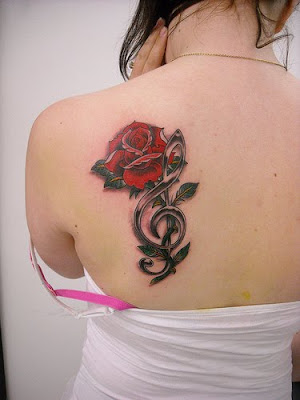 Feminine Back Tattoo - Flower Tattoo with Musical Note Tattoo Design