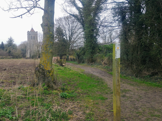 Follow the track through the churchyard and back to the start of the walk