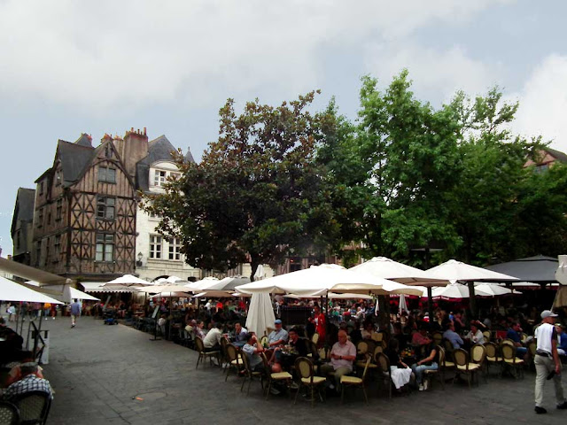 Place Plumereau, Tours.  Indre et Loire, France. Photographed by Susan Walter. Tour the Loire Valley with a classic car and a private guide.