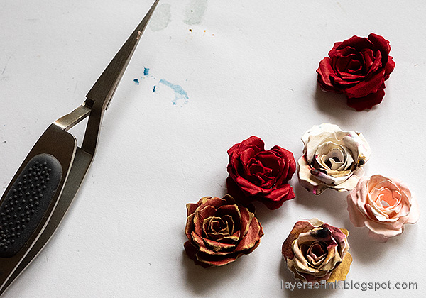 Layers of ink - Rose and Filmstrip Tag Tutorial by Anna-Karin Evaldsson. Shape the paper roses.