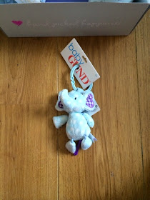 blue elephant toy to hang on a baby pram