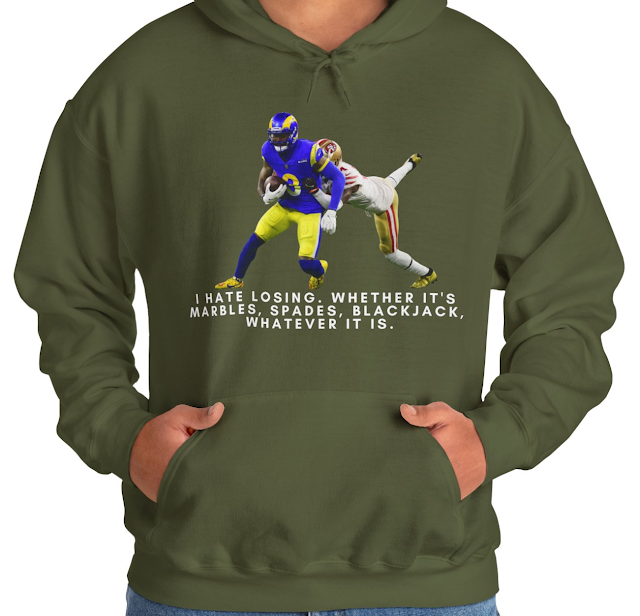 A Hoodie With NFL Player Odell Beckham Jr Trying to Escape Opponent Grab and Quote I Hate Losing Whether it's Marbles, Spades, Blackjack, Whatever It Is