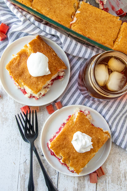 two pieces of cake on white plates