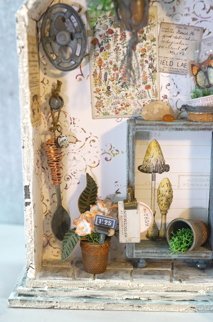 ASW | Tim Holtz Shrine: Shabby Chic Potting Shed Miniature with Speckled Egg and Field Notes details.