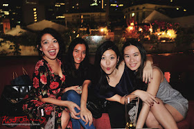 A group of friends enjoying a night out at Screening Room Rooftop Bar, Singapore. Photo by Kent Johnson for Street Fashion Sydney.