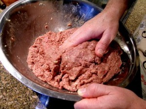 Mixing All The Ingredients for the Swedish Meat Balls in a Large Bowl