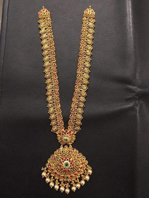 Trendy Antiqye haar with Red Kundan