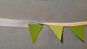 triangles placed in fold of bias binding