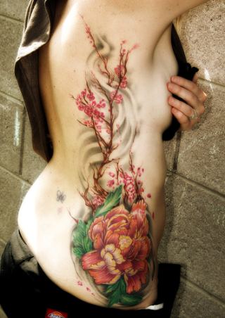 Flower Tattoos On Back. butterfly and flower tattoos
