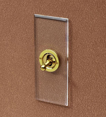 The Forbes and Lomax ATW - Architrave Single Switch invisible plate brass dolly switch