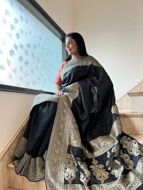 Black saree with koniyas