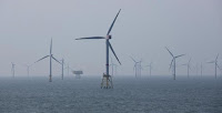 Wind turbines are pictured in RWE Offshore-Windpark Nordsee Ost in the North sea, 30 km from Helgoland, Germany, May 11, 2015. (Credit: Reuters/Christian Charisius/Pool) Click to Enlarge.