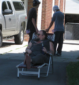 biker guy with bottle cozie