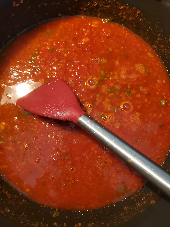 fresh tomato sauce with black olives