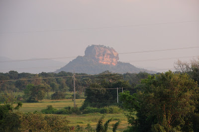 Sigiriya Rock seen from the pool at the Aliya Resort Hotel