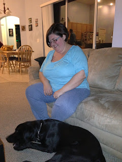 Michele watches as Coach chews on one of the nylabones.