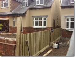 Pretty fencing between the two houses