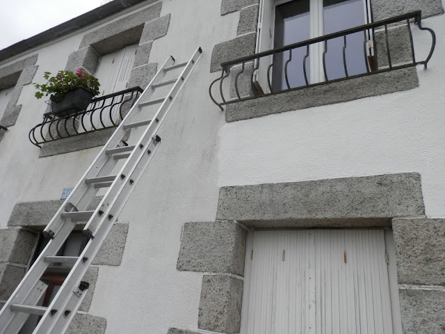 painting the exterior of an old french house