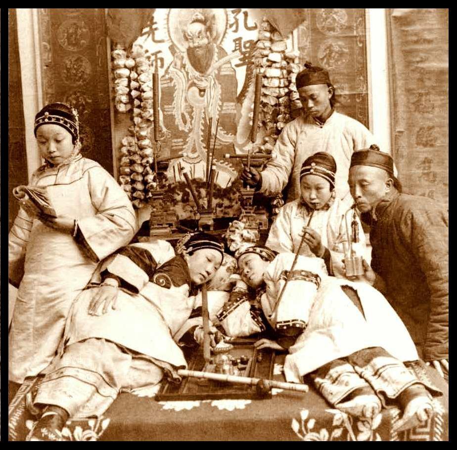 GIRLS WITH BOUND FEET SMOKING DOPE in an OPIUM DEN in CANTON.jpg