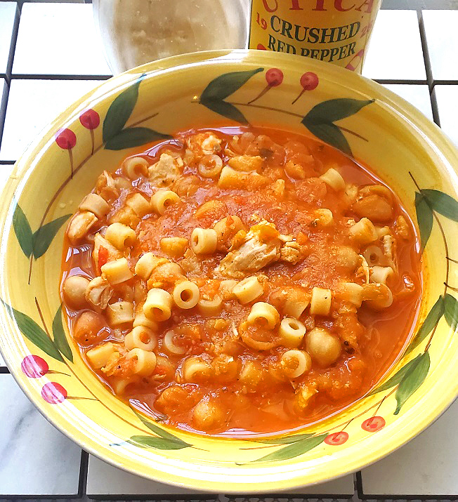 pasta fagioli with chicken in a bowl