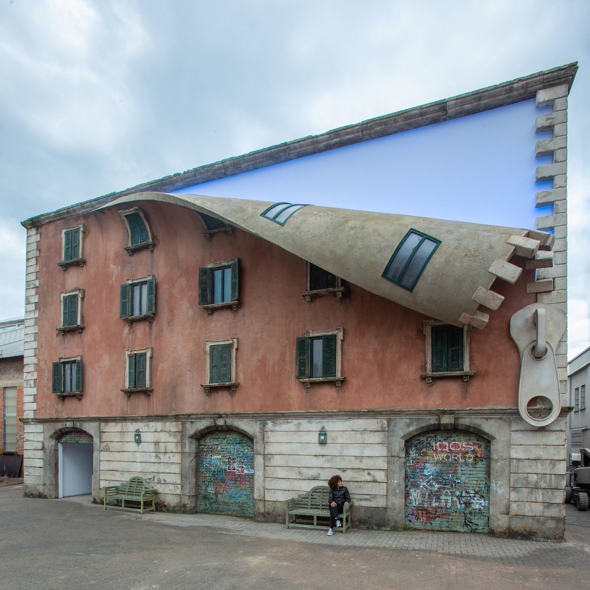 Sculptor 'Unzips' A Building In Milan With His Mind-Blowing Art Installation