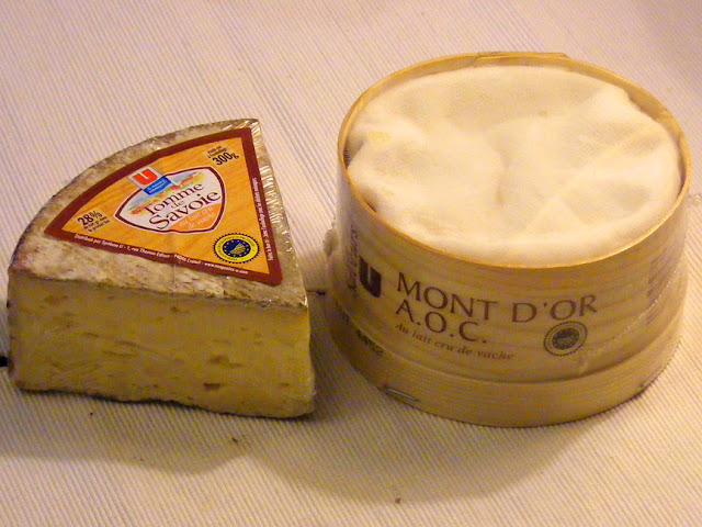 Tomme de Savoie and Mont d'Or French cheeses. Photo by Loire Valley Time Travel.
