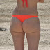 Girl with insane perfect ass in bikini thong on the beach
