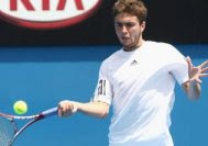 Gilles Simon, in action against Mario Ancic at the Australian Open