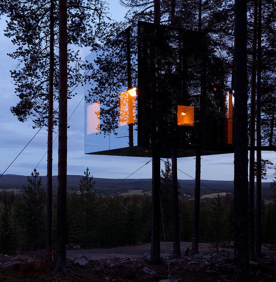  14 Crazy Hotels That Will Give You Serious Travel Goals - The Mirrorcube Tree House Hotel in Sweden is like a hideout in the trees: The entire thing is camouflaged behind mirrored walls.