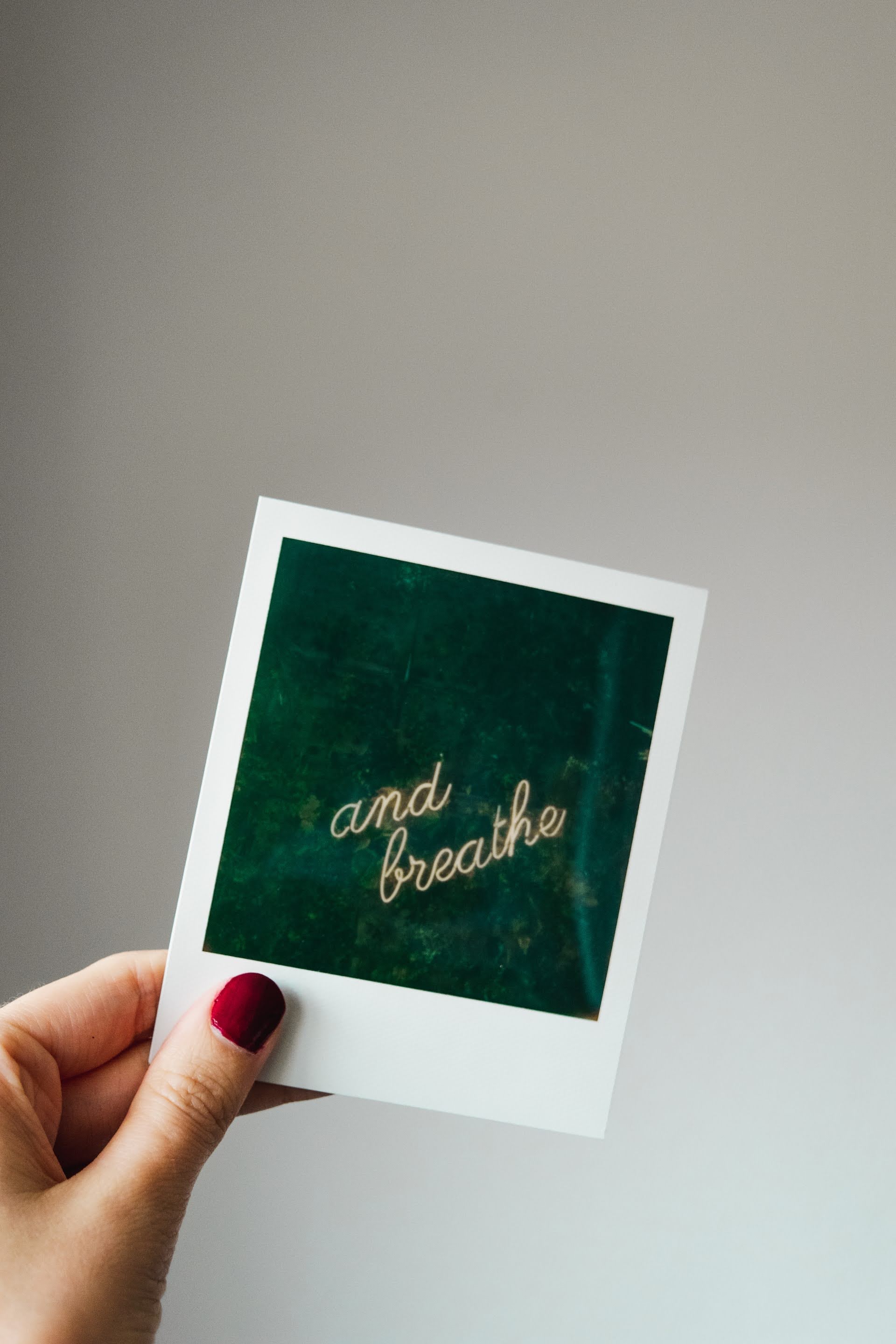 White and Green Polaroid Photo | Photo by Designed for Adventure via Unsplash