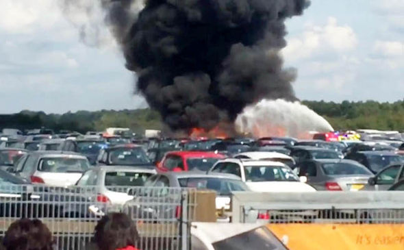 Four dead after plane crashes into cars at airport exploding into fireball