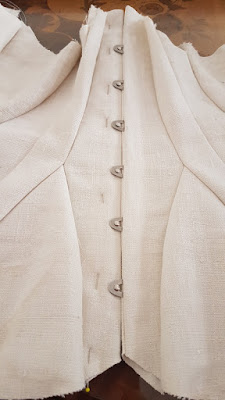 the front part from the edwardian corset is closed with the hook and eyes