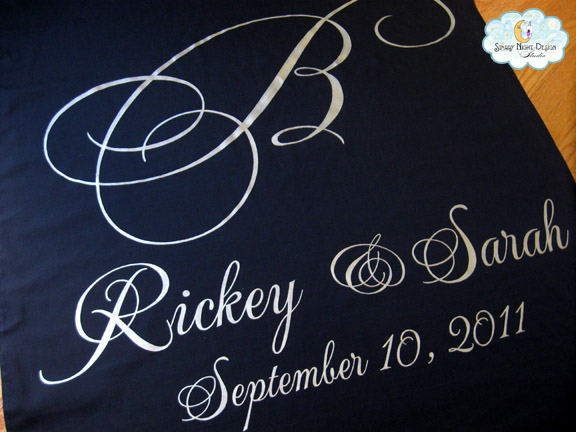 Sarah wanted black fabric with a formal monogram painted in champagne gold