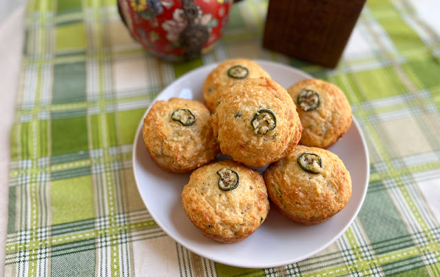 Food Lust People Love: Slightly spicy and oh so cheesy, these Jalapeño Cheddar muffins are fluffy inside with a little cheesy crunch on the outside. In short, they are delicious. Perfect for breakfast OR snack time. They are also a great accompaniment for soup!