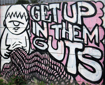 Tag which says Get Up In Them Guts