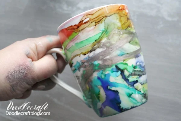 Use Alcohol inks to create a stunning work of abstract art on a ceramic mug for the perfect holiday gift. With full video tutorial instructions too!