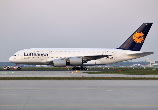Lufthansa Airbus A380-800 is being towed