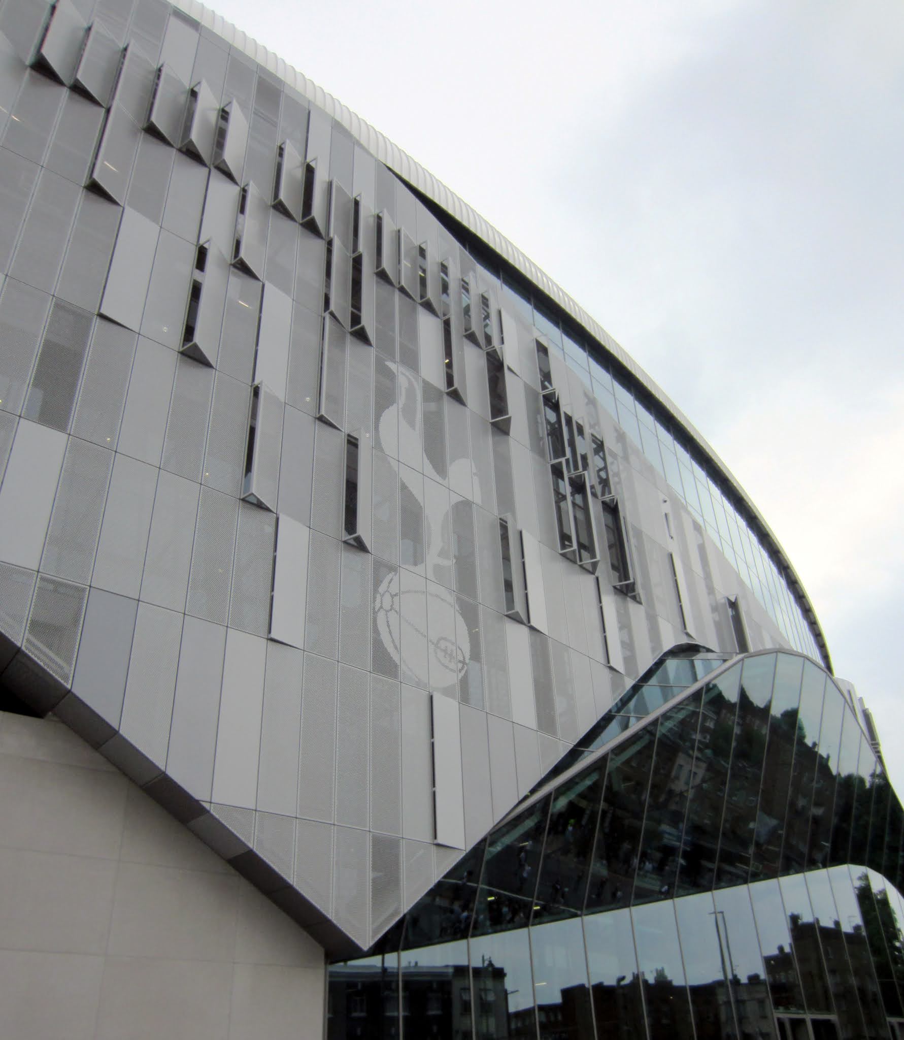 Tottenham Hotspur logo on the exterior façade of Tottenham Hotspur Stadium