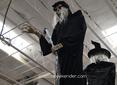 Scare the neighborhood kids this Halloween with the 6-Foot Animated Grim Reaper