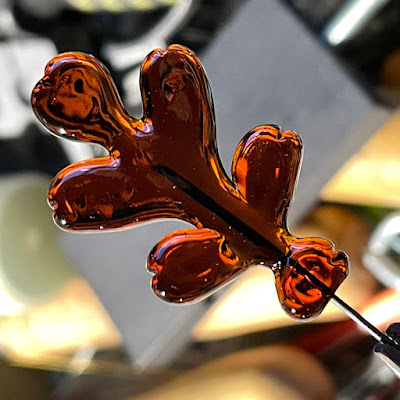 Handmade lampwork glass oak leaf headpin by Laura Sparling