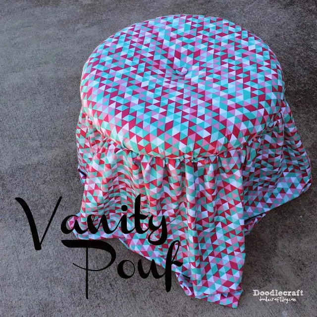 http://www.doodlecraftblog.com/2014/11/no-sew-upholstery-vanity-pouf.html